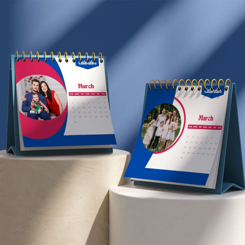 A wall calendar wire-bound and hanging open at the month