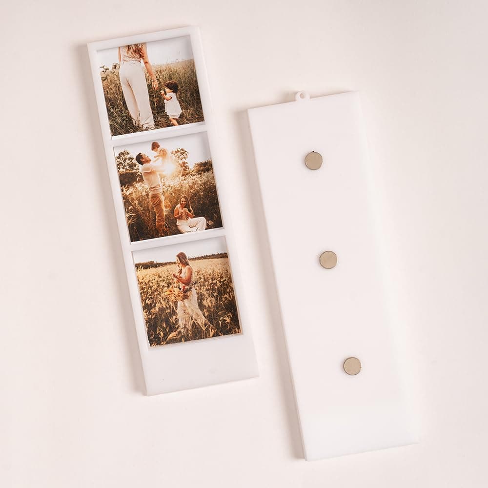 A sheet of photo magnets cut and separated on the bench